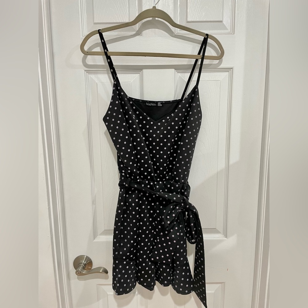 Size US 12 black polka dot romper from Boohoo